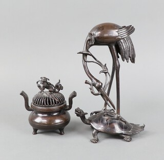 A Meiji period bronze figure of a stork on a turtle 22cm x 6cm x 9cm together with a twin handled Koro 12cm x 8cm 