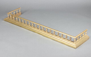 A 19th Century gilt metal fire curb 15cm h x 152cm w x 38cm d 