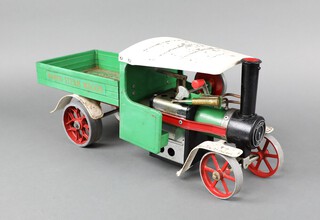 A green Mamod steam wagon complete with burning but missing steering rod, the boiler plate marked Mamod SW1 19cm h x 41cm l x 13cm w  