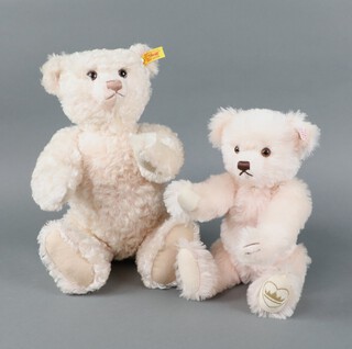 A modern pink Steiff bear with glass eyes, growler and ear button 006005 41cm, a Steiff English Rose baby bear with gilt necklace and crown embroidered left foot and ear button 661983, with certificate, 32cm 