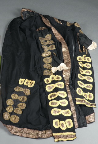 An early 20th Century Lord Chancellor's costume from The Gilbert and Sullivan opera "Iolanthe", together with a The D'oyly Carte Opera Company, Gilbert and Sullivan's Opera record of productions 1875 to 1961, Roger Wood "A D'oyly Carte Album" and Robin Wilson and Frederick Lloyd "Gilbert and Sullivan The D'oyly Carte Years" 