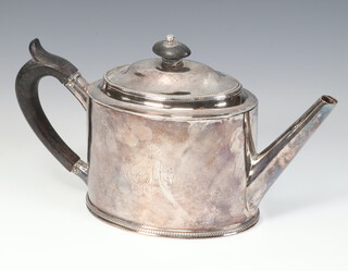 A George III oval teapot with ebony mounts and engraved monogram London 1784, 13cm, maker Hester Bateman, 400 grams 