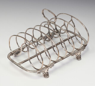 A William IV silver 7 bar toast rack on shell feet, London 1836, 17cm, 218 grams 