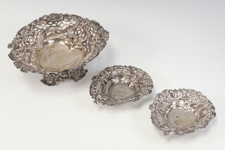 A Victorian repousse silver heart shaped bon bon dish, London 1897, a pair of small ditto Birmingham 1897, 120 grams 