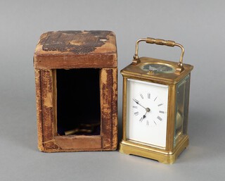 A 19th Century French 8 day striking carriage clock, the 5cm enamelled dial with Roman numerals contained in a gilt metal case 11cm h x 7cm x 6cm, complete with carrying case and key  