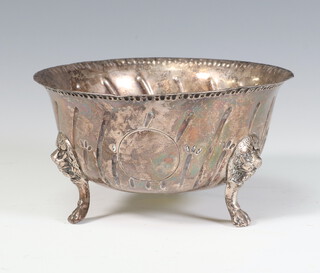 A silver repousse bowl with lion knees and claw feet London 1929, 155 grams 