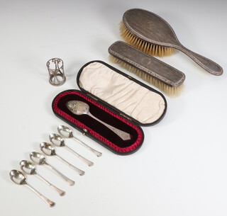 A set of 6 silver coffee spoons Sheffield 1919, a cased presentation spoon, hair brush clothes and Continental bottle holder, weighable silver 86 grams 