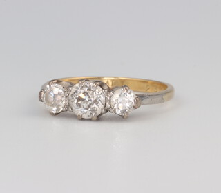 An 18ct yellow gold 3 stone diamond ring approx 1 carat, 2.6 grams, size M 