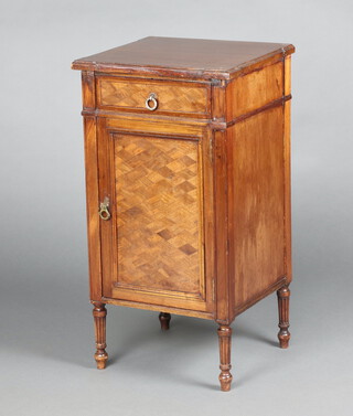 A French style mahogany and marquetry bedside cabinet fitted a drawer above panelled door, raised on turned and fluted supports 76cm h x 40cm w x 38cm d 