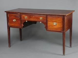 A Georgian mahogany sideboard fitted a central drawer flanked by a drawer and cupboard with brass oval drop handles, raised on square tapered supports 95cm h x 160cm w x 68cm d 