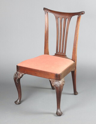 An 18th Century Irish carved mahogany side chair with vase shaped spat back and upholstered drop in seat on carved cabriole supports 98cm h x 56cm w x 46cm d  