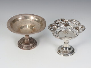 A silver tazza with pierced decoration together with a plain ditto, both weighted and Birmingham 1913 