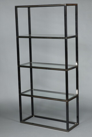 Pierre Vandel of Paris, a tubular black and gilt metal 4 tier bookcase/shelving unit 190cm h x 90cm w x 37cm d 