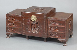 A carved camphor coffer with hinged lid and with 3 drawers to each side, on cabriole supports 58cm h x 121cm w x 51cm d (contact marks in places)