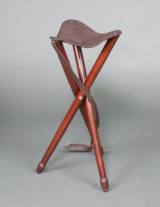 A mahogany finished 3 legged folding stool 70cm h x 33cm 