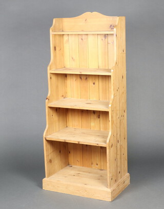 A Victorian style pine waterfall bookcase fitted 5 shelves 137cm h x 57cm w x 38cm d 