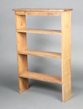 A stained pine 3 tier bookcase 119cm h x 78cm w x 24cm d 