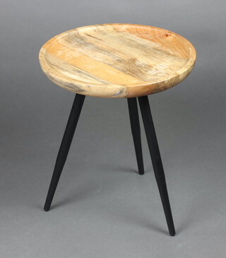 A circular turned elm coffee table with dish top on tubular metal supports 46cm h x 39cm 