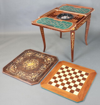 A mahogany finished games table incorporating a chessboard, bridge table, roulette, raised on cabriole supports 75cm h x 76cm x 76cm
