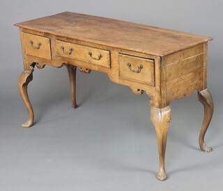 A 17th/18th Century oak dresser base with carved apron, fitted 1 long and 2 short crossbanded drawers, raised on cabriole supports 77cm h x 136cm w x 49cm d 