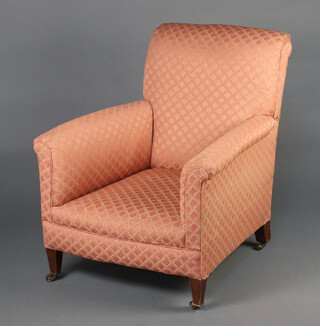 An Edwardian armchair upholstered in pink and chequered material, raised on square supports 80cm x 58cm 