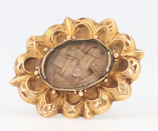 A 19th Century gilt metal mourning brooch 4cm 