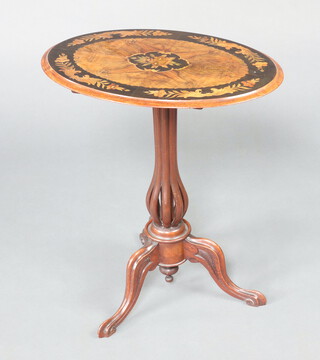 A Victorian oval figured and quarter veneered walnut snap top wine table, raised on pierced bulbous column and tripod base 69cm h x 61cm w x 43cm d 