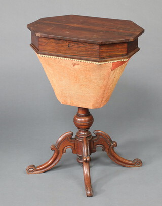 A Victorian octagonal rosewood work table the basket of waisted form, raised on a pillar and tripod base 72cm h x 52cm w x 39cm d 