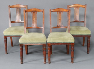 A set of 4 Edwardian walnut slat back dining chairs with overstuffed seats, on turned supports 92cm h x 48cm w x 44cm d 