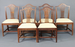 A set of 6 19th Century mahogany Hepplewhite style camel back dining chairs with upholstered drop in seats raised on square tapered supports 94cm h x 54cm w x 44cm d 