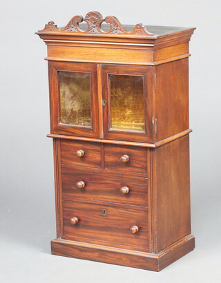 A Victorian mahogany apprentice cabinet with moulded cornice, having a green plush interior enclosed by a pair of bevel panelled glass doors, the base fitted 4 drawers, raised on bracket feet 70cm h x 34cm w x 22cm d  