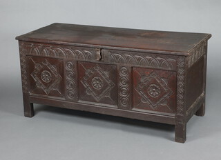 A 17th/18th Century oak coffer of panelled construction with iron lock front, 68cm h x 141cm w x 60cm d 