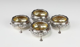 A set of 4 Victorian repousse silver table salts with hoof feet, London 1893, 182 grams