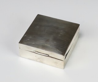 A silver engine turned cigarette box Birmingham 1922, 9cm, 