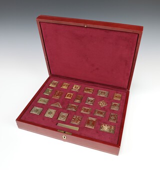 A set of 25 silver gilt stamps from The Empire Collection, no.6030 of 10,000, 466 grams, in original fitted box (a/f) and with associated paperwork 