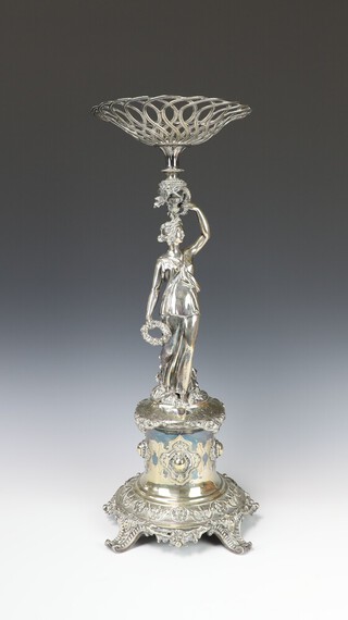 An impressive Victorian silver plated centrepiece with cut glass bowl, the stem in the form of a classical lady, raised on a circular plinth with scroll feet 50cm  