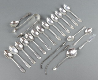 Six silver teaspoons Sheffield 1932, 10 others, a butter knife, pair of nips and 2 straws, 304 grams 