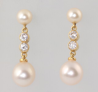 A pair of 18ct yellow gold cultured pearl and diamond drop earrings, the 4 diamonds each approx. 0.07ct, 25mm, 3.7 grams 
