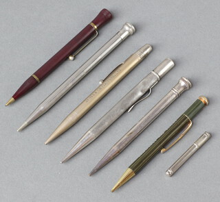 A silver propelling pencil, 5 other pencils 