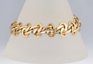 An 18ct yellow gold flat link bracelet 59.4 grams, 19cm 