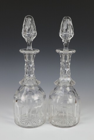 A pair of Edwardian mallet shaped decanters and stoppers 30cm 