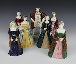 A set of Coalport figures of The Royal Collection Henry VIII and his six wives by Robert Worthington 23cm 