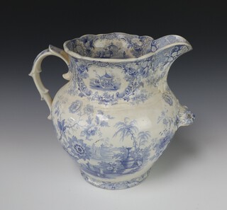 A Victorian blue and white Japan Flowers pattern washstand jug with S scroll handle and lion mask grip 28cm 