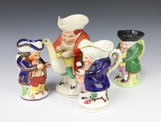 A Victorian Staffordshire Toby jug in the form of a snuff taker 18cm, a ditto of a teapot with snuff taker 21cm (restored), 2 later ditto 16cm 