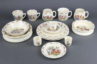 A collection of Royal Doulton Bunnykins ware comprising 2 bowls, 2 tea cups, 1 large tea cup, 2 coffee cups, 3 egg cups, 2 dessert bowls, 2 saucers, 3 plates 