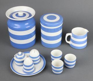 A quantity of T G Green & Company Cornishware, blue and white banded, comprising 6 storage jars, coffee pot (a/f), milk jug (a/f), 2 cream jugs (1 a/f), 3 plates, 4 piece condiment, 2 lids, 2 plates, a dessert bowl (a/f), all with green mark to base and 4 saucers with later black mark  