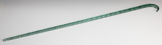 A Victorian green glass walking cane 84cm 