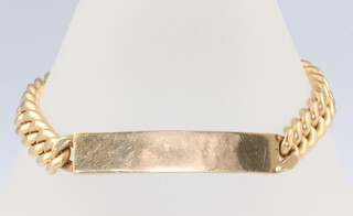 A yellow metal 750 identity bracelet 19 grams 