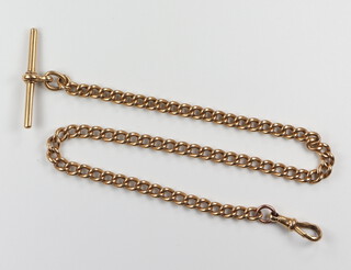 A yellow metal 18ct Albert with T bar and clasp, 28.3 grams 