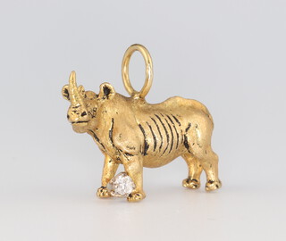 A G & G Appleby limited edition yellow metal 18k diamond charm in the form of a rhinoceros, set with a 0.1ct diamond, no.5 of 100, 13.8 grams, 28mm  